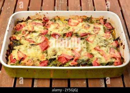 Traditional authentic homemade vegetable lasagna with spinach, tomatoes and cheese Stock Photo