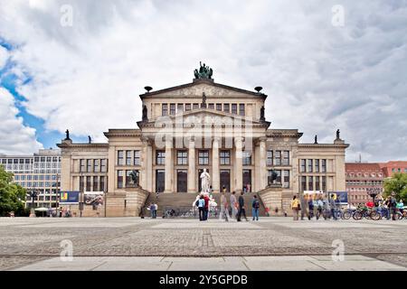 Berlin, Germany, July 24 2009, Tourists explore the stunning Konzerthaus at Gendarmenmarkt in Berlin, showcasing its impressive architecture under a c Stock Photo