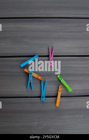 clothespins on a wooden table Stock Photo