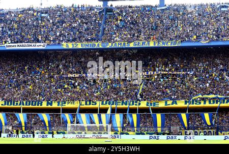 Buenos Aires, Argentina. 21st Sept 2024. Boca Juniors’ supporters cheer for their team during the Argentine Professional Football League Tournament 2024 'Cesar Luis Menotti' match against River Plate, at La Bombonera stadium in Buenos Aires, on September 21, 2024. Credit: Alejandro Pagni/Alamy Live News Stock Photo