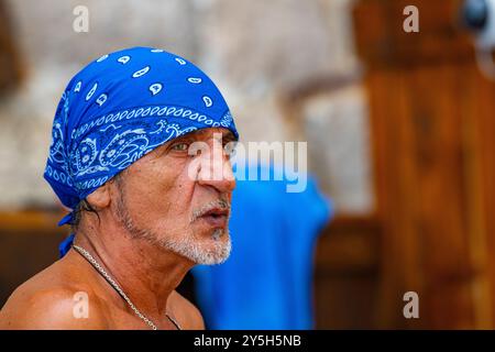 A cool Croatian man wearing a blue bandanna Stock Photo