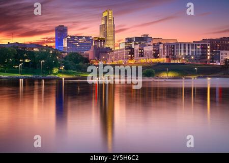 Omaha, Nebraska, USA. Cityscape image of downtown Omaha, Nebraska with reflection of the skyline at beautiful autumn sunset. Stock Photo