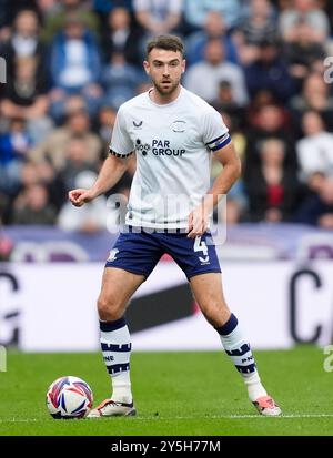 Ben Whiteman of Preston North End passes the ball forward during the ...