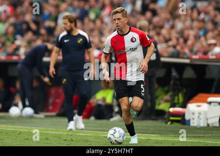 Rotterdam, Netherlands. 22nd Sep, 2024. ROTTERDAM, NETHERLANDS - SEPTEMBER 22: Gijs Smal of Feyenoord runs with the ball during the Dutch Eredivisie match between Feyenoord and NAC Breda at Stadion Feijenoord on September 22, 2024 in Rotterdam, Netherlands. (Photo by Hans van der Valk/Orange Pictures) Credit: dpa/Alamy Live News Stock Photo