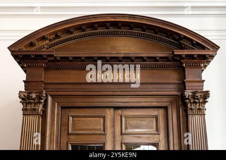 Wooden pediment about the entrance door to St Mary-le-Bow Church, City of London, England Stock Photo