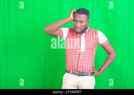 portrait of a handsome worried young man is thinking about something. Stock Photo