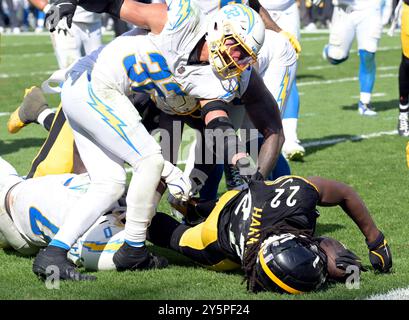 Pittsburgh, United States. 22nd Sep, 2024. Pittsburgh Steelers running back Najee Harris (22) runs 21 yards to the one yard line as Los Angeles Chargers safety Alohi Gilman (32) assist on the tackle in the fourth quarter of the Steelers 20-10 win at Acrisure Stadium on Sunday, Sept. 22, 2024 in Pittsburgh. Photo by Archie Carpenter/UPI Credit: UPI/Alamy Live News Stock Photo