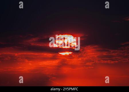 Fiery red California sunrise with dramatic layers of clouds. Stock Photo