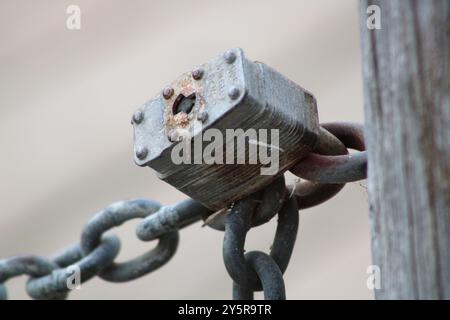 rusted old padlock on chain Stock Photo