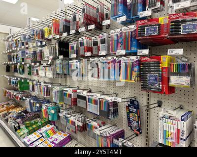 Image of shelves with a different pens, stationery and office supplies in Target retail store Stock Photo