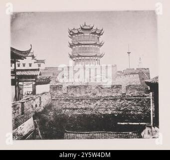 Vintage photo of Wuchang Tower (Yellow Crane Tower). Hubei Province. Illustrations of Qing China, 1875 Yellow Crane Tower is a traditional Chinese tower located in Wuhan. The current structure was built from 1981 to 1985, but the tower has existed in various forms from as early as AD 223. The current Yellow Crane Tower is 51.4 m (169 ft) high and covers an area of 3,219 m2 (34,650 sq ft). It is situated on Snake Hill, one kilometer away from the original site, on the banks of the Yangtze River in Wuchang District. Stock Photo