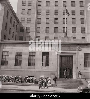 America of the 1940s. Municipal office building, which is prepared for air raids with sand bags. Baltimore, Maryland. USA. April 1943 (By M. Collins, photographer) Stock Photo