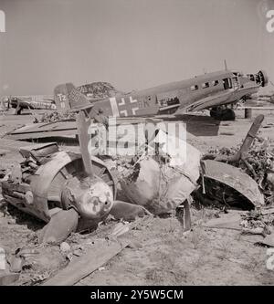 Vintage photo of wrecked German planes at El Aouiana airport. Tunis, Tunisia. June 1943 Stock Photo