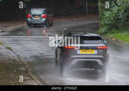 Chippenham, Wiltshire, UK, 23rd Sep, 2024. Drivers are pictured braving very heavy rain in Chippenham as torrential showers make their way across Southern England.Credit: Lynchpics/Alamy Live News Stock Photo