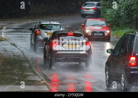 Chippenham, Wiltshire, UK, 23rd Sep, 2024. Drivers are pictured braving very heavy rain in Chippenham as torrential showers make their way across Southern England.Credit: Lynchpics/Alamy Live News Stock Photo