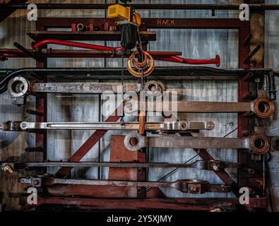 Tools hanging on the wall at the Ropley engineering works home of the Watercress line. Stock Photo