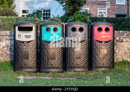 Recycling and general waste collection bins in a rural location. Credit John Rose/Alamy Stock Photo