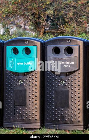 Waste Management / Two Recycle bins and two Garbage bins stand ready ...