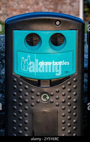 Recycling and general waste collection bins in a rural location. Credit John Rose/Alamy Stock Photo