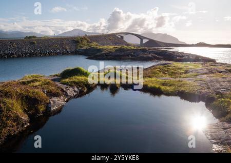 Atlantic Ocean Road with a famous Storseisundet Bridge. Picturesque northern Norway nature landscape and modern highway construction masterpiece union Stock Photo