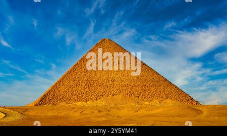 Red Pyramid is one of the greatest accomplishments in pyramid building as a first true pyramid by the Pharoah Snefuru seen in a spectacular wide angle view at the Dahshur necropolis Stock Photo