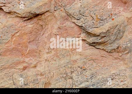 Close up multi colored Wingate Sandstone cliff face in canyon of Colorado National Monument Stock Photo