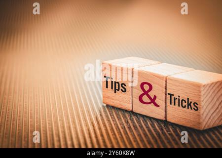 tips and tricks symbol, Conceptual words on wooden cubes Stock Photo
