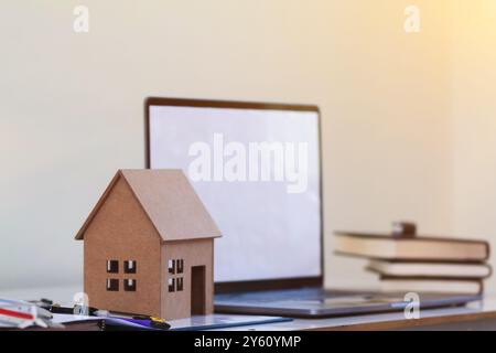 A model house rests on the desks of engineers and designers to please investors with the design work before they begin. Home design ideas by architect Stock Photo
