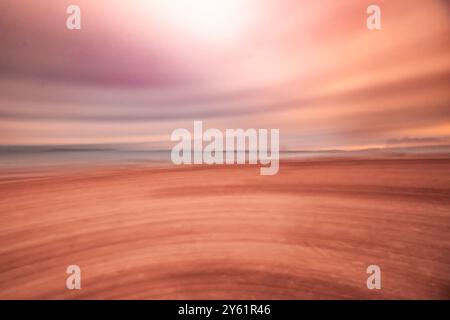artistic vision of a sunset on the beach, watercolor effect, impressionism, dreamlike effect inspiring calm and tranquility Stock Photo