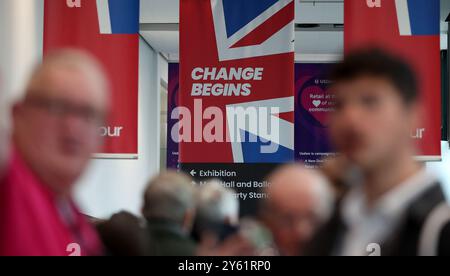 Liverpool, Britain. 23rd Sep, 2024. People attend the Labour Party Conference in Liverpool, Britain, on Sept. 23, 2024. The United Kingdom (UK)'s Labour Party gathers in Liverpool on Monday for its annual conference less than three months after a landslide victory in the general election. Credit: Li Ying/Xinhua/Alamy Live News Stock Photo