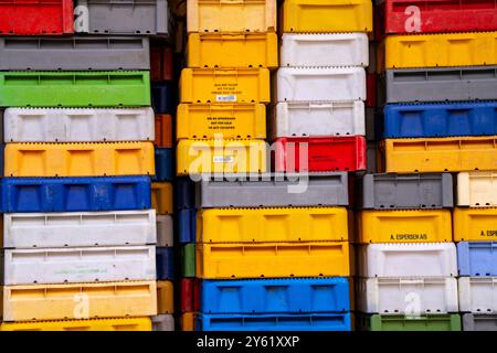 The city harbor of Sassnitz, island Rügen, boxes for fish waiting for the new catch, at the fishing port, Mecklenburg-Vorpommern, Germany Stock Photo