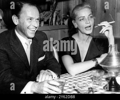 Singer and actor Frank Sinatra in the company of Lauren Bacall, the widow of Humphrey Bogart. March 1958 Stock Photo