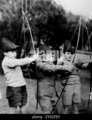 Prince Philip Goes 'Hunting' In this picture made about 1929, during archery practice at the MacJannet School at St Cloud, France, is a boy (second from left) destined to become the present Duke of Edinburgh, husband of Queen Elizabeth.  From left to right are:  Jacques de Bourbon: the Prince: Teddy Culbert: Martha Robertson: and Princess Anne of Bourbon-Parma (now the wife of Prince Michael of Roumania).  The Prince attended the school for three years, from the age of eight to the age of eleven.  18th February 1952 Stock Photo