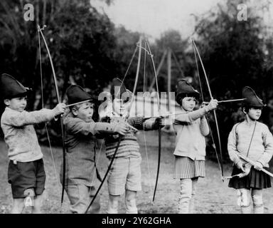 Prince Philip Goes 'Hunting' In this picture made about 1929, during archery practice at the MacJannet School at St Cloud, France, is a boy (second from left) destined to become the present Duke of Edinburgh, husband of Queen Elizabeth.  From left to right are:  Jacques de Bourbon: the Prince: Teddy Culbert: Martha Robertson: and Princess Anne of Bourbon-Parma (now the wife of Prince Michael of Roumania).  The Prince attended the school for three years, from the age of eight to the age of eleven.  18th February 1952 Stock Photo