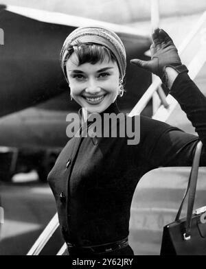 Film actress Audrey Hepburn in turban style hat arrives at London Airport from New York. 21st May 1953 Stock Photo