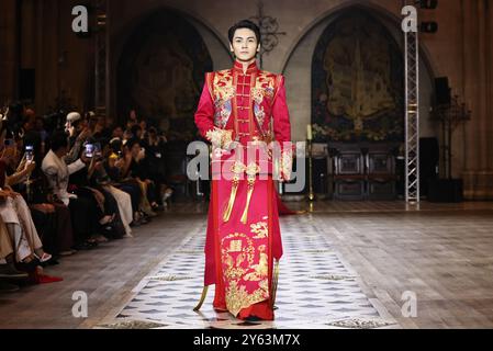 Paris, France. 23rd Sep, 2024. A model presents a creation of the Heaven Gaia Moon Spring/Summer 2025 collections by Chinese fashion designer Xiong Ying during Paris Fashion Week in Paris, France, Sept. 23, 2024. Credit: Gao Jing/Xinhua/Alamy Live News Stock Photo