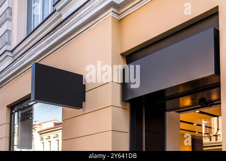 Two Mock Ups Of Restaurant Street Black Signboards On Yellow Wall Stock Photo