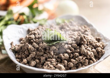 Boiled gnocchi from chicken or beef liver prepared in beef broth. Stock Photo