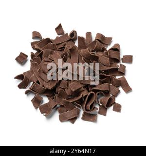 Heap of pure Chocolate flakes isolated on white backgeround close up Stock Photo