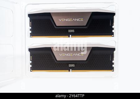December 2023, Tallinn, Estonia. Corsair. High-performance black and silver Vengeance DDR5 memory modules on a clean white background Stock Photo
