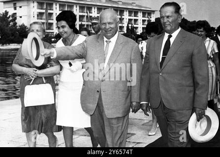 Kruschevs at holiday retreat . Brioni , Yugoslavia :  Soviet Prime Minister , Nikita Kruschev , and his wife , Nina ( partly obscured , left ) and their hosts , Yugoslav President Josip Broz Tito and his wife , Jovanka pictured on the island retreat of Brioni , 25th August .    Brioni is the island retreat of the President and his family .  Mr and Mrs Kruschev and other members of their family are now on a 15 day visist to Yugoslavia .  27 August 1963 Stock Photo