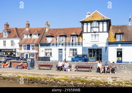 Lymington Quay - People sat by The Ship Inn on Lymington Town Quay in Lymington Hampshire a town in the New Forest Hampshire England UK GB Europe Stock Photo