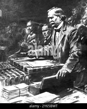 David Lloyd George  , Minister of Munitions , showing a high-explosive fuse in the House of Commons during his speech in Parliament introducing the Munitions Bill .  He was explaining the difficultiies of suddenly and enormously increasing the output of complicated mechanism .   July 1915 Stock Photo