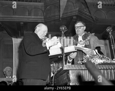 Mr Churchill Gets Freedom Of Hellfire Corner The Mayor of Dover , Councillor , W R Fish handing over the casket containing the freedom to Mr Churchill at Dover Town Hall .  15th August 1951 Stock Photo