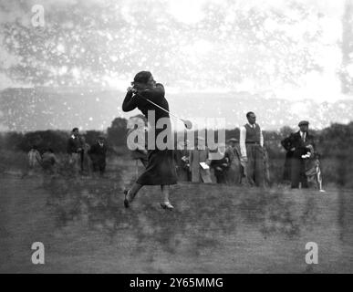 Mixed foursomes golf match at the Worplesdon Golf Club .  Miss Clarrie Tiernan , the Irish champion drives off . 1935 Stock Photo