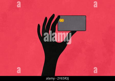 A graphic illustration depicting a black silhouette of a hand holding a gray credit card against a vibrant pink backdrop The design is minimalistic an Stock Photo