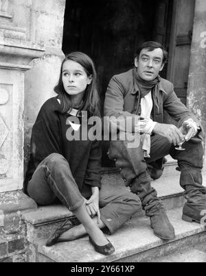 Geraldine Chaplin , daughter of Charles Chaplin shares a step seat with actor Richard Johnson on the set of ' The Amorous Adventures of Moll Flaunders ' at Chilham Castle , Kent . 10 September 1964 Stock Photo