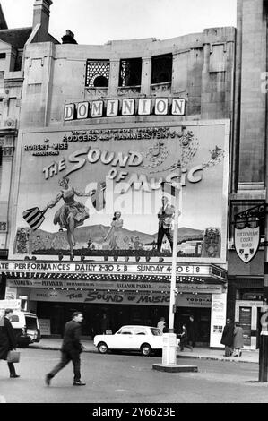 A billboard advertising The Sound of Music film at the Dominion Theatre , Tottenham Court Road , West End London , England . September 1965 Stock Photo