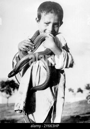 Junior snake charmer 12th July 1960 New Delhi, India Stock Photo