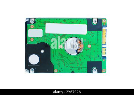 Detailed view of internal components of hard disk drive, showcasing intricate circuitry and mechanical parts. Technology and computing themes related Stock Photo